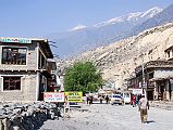 102 Jomsom With Dhaulagiri Poking Above Ridge Jomsom (2760m) is the capital of the Mustang district, next to the Kali Gandaki River. The summit of Dhaulagiri pokes up above an intervening ridge from Jomsom.